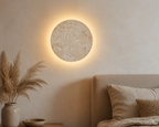 Tsuki Stone Wall Lamp, styled bedroom wall view