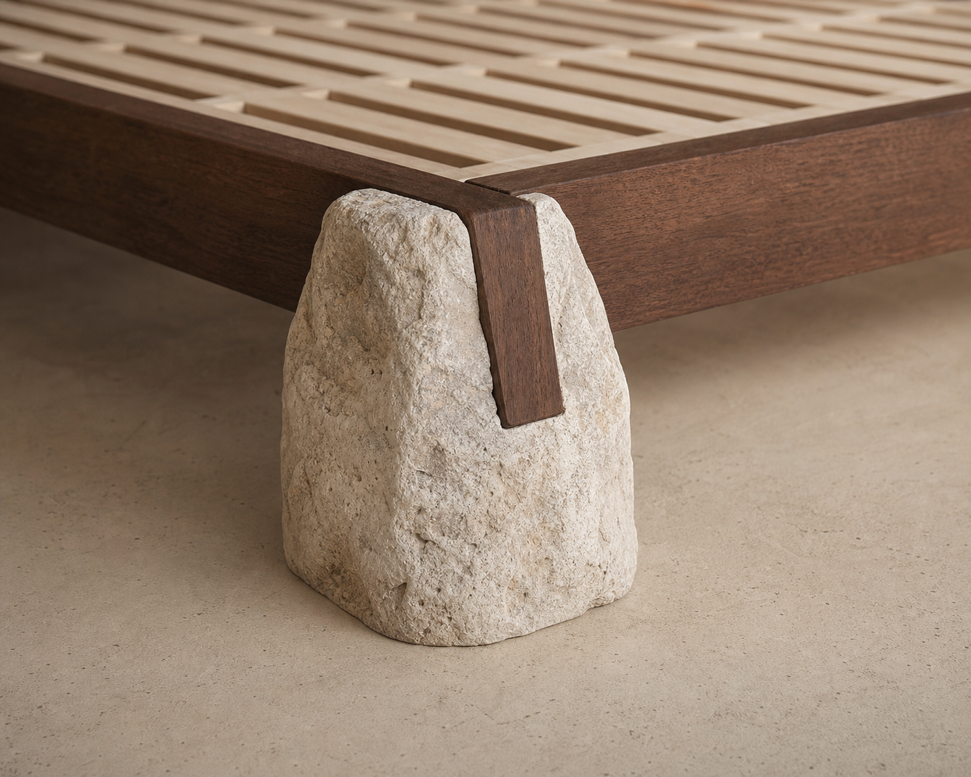 Kai Log Bed Frame, close view of timber rail and stone-like support