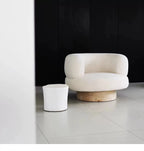 Mizu Swivel Lounge Chair, rice white in a minimal interior