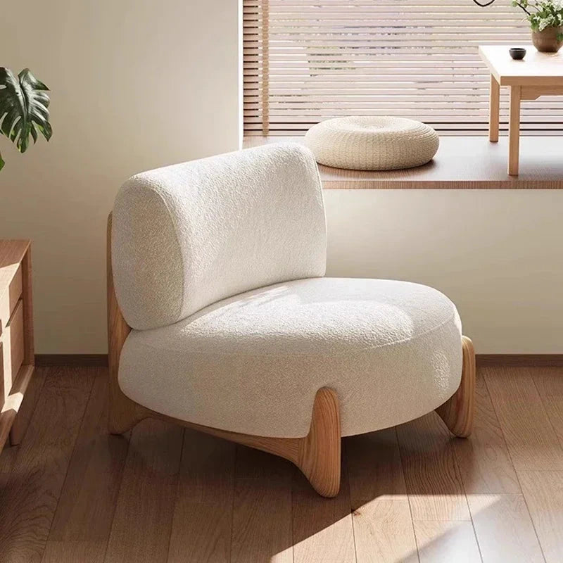 Momo Rounded Lounge Chair, window-side lifestyle setting