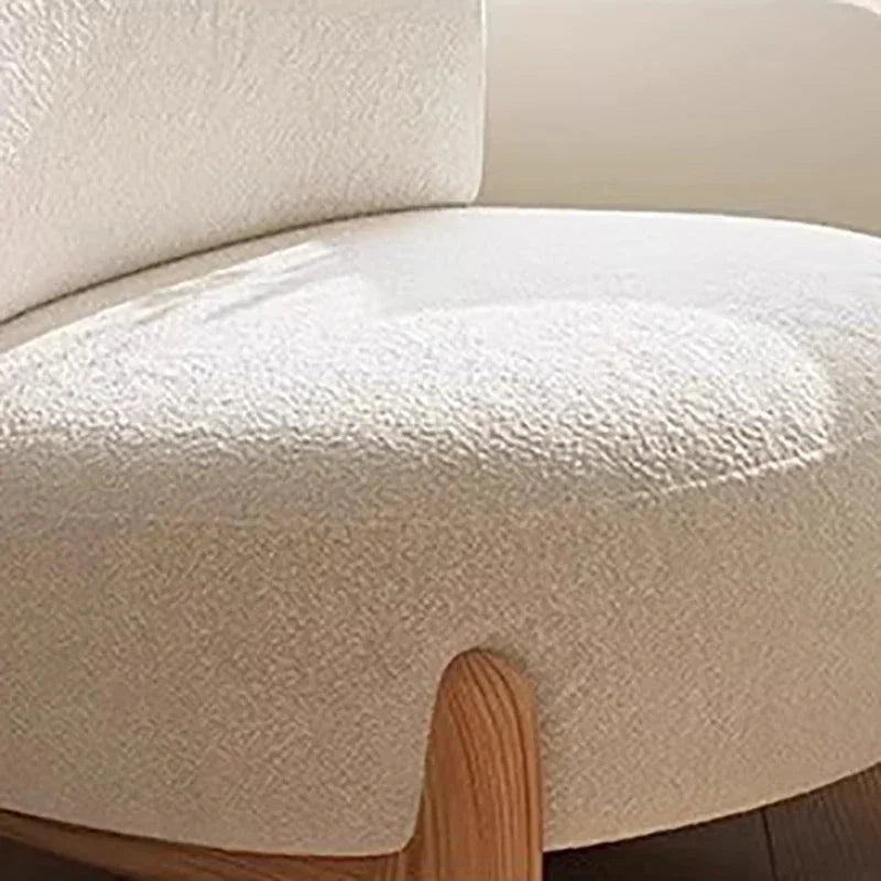 Momo Rounded Lounge Chair, upholstery and timber-foot detail