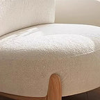 Momo Rounded Lounge Chair, upholstery and timber-foot detail