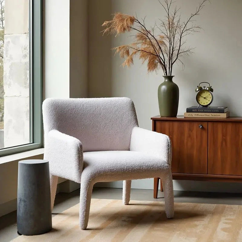 Nami Upholstered Armchair, white upholstery in a window-side setting