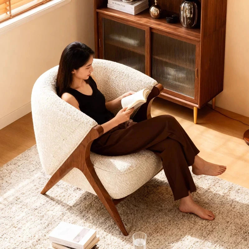 Ren Curved Lounge Chair, cream chair in use