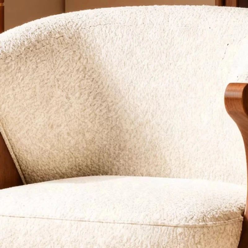Ren Curved Lounge Chair, cream upholstery close-up