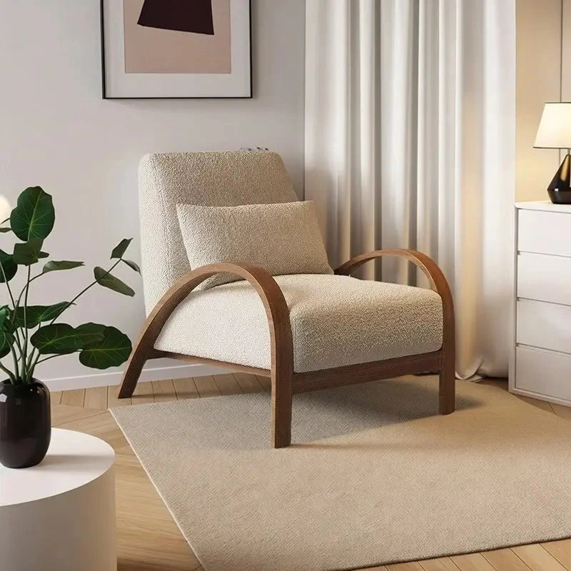 Yori Curved Wood Lounge Chair, beige chair in a bright interior