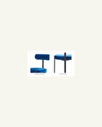 Emi Three-Leg Dining Chair, upholstered seat and back support detail