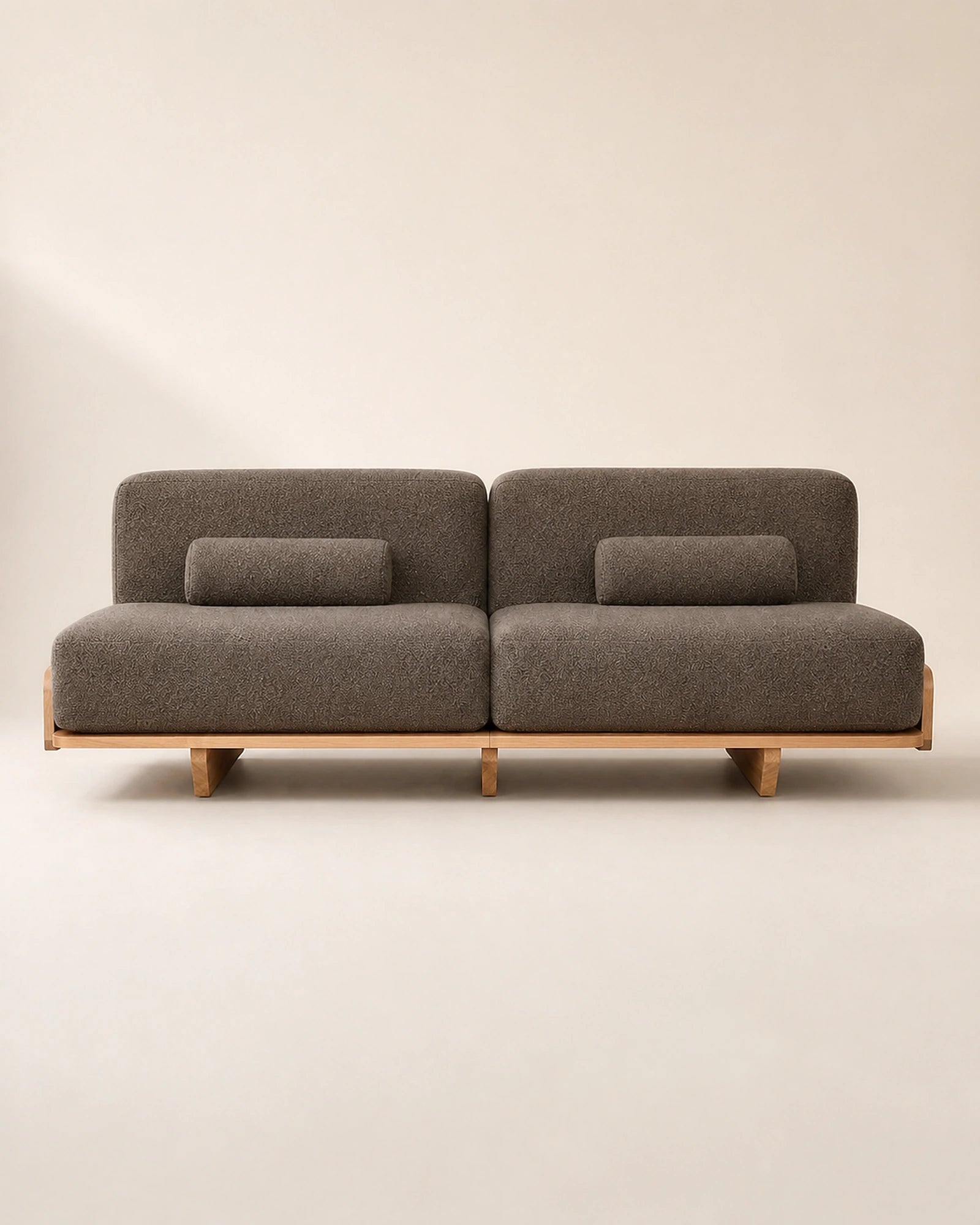 Hina Timber Platform Sofa front view on warm studio background