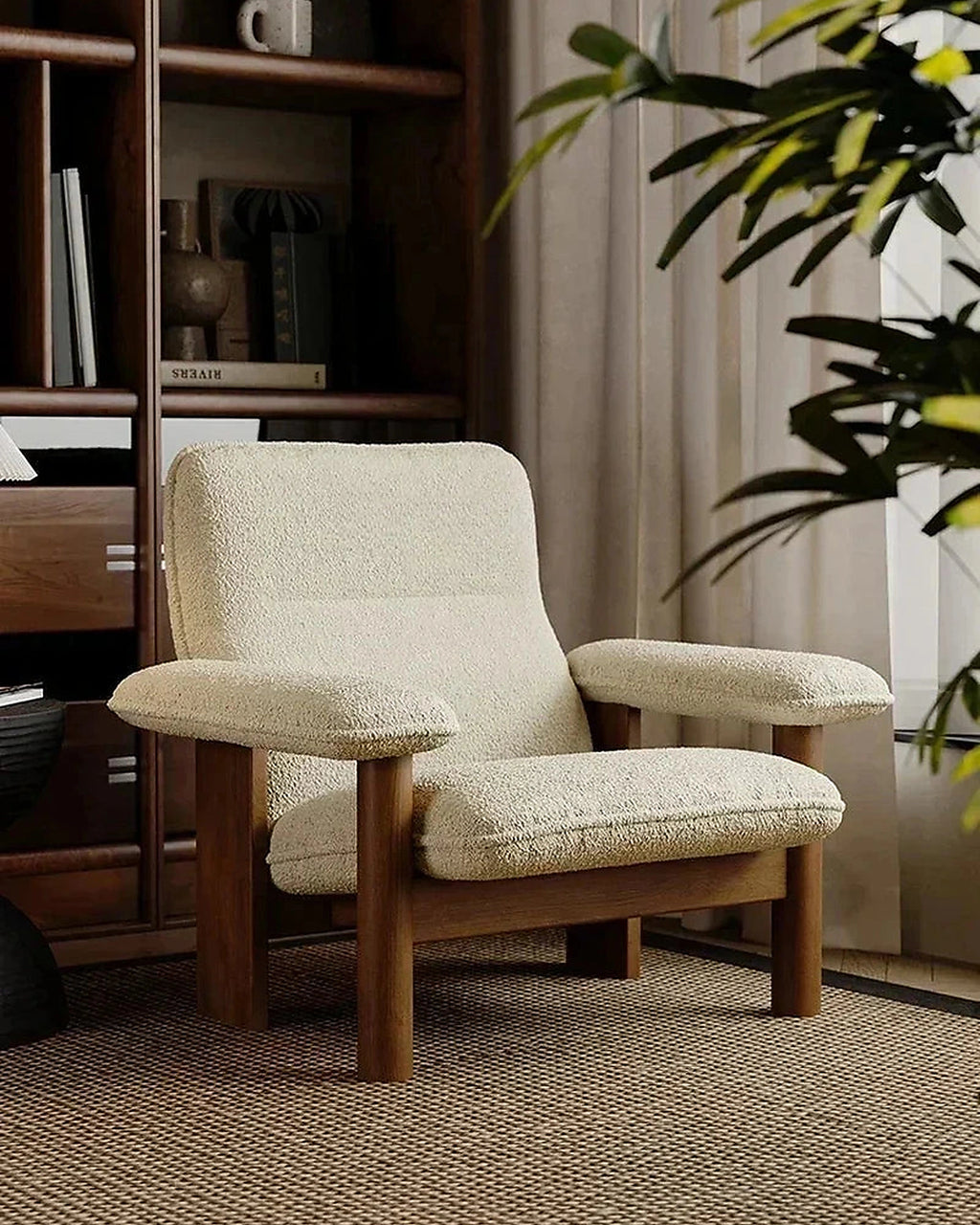 Kei Wood-Frame Lounge Chair, cream chair in a library setting