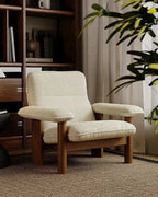 Kei Wood-Frame Lounge Chair, cream chair in a library setting