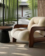 Kumo Wood-Frame Lounge Chair, front three-quarter lifestyle view