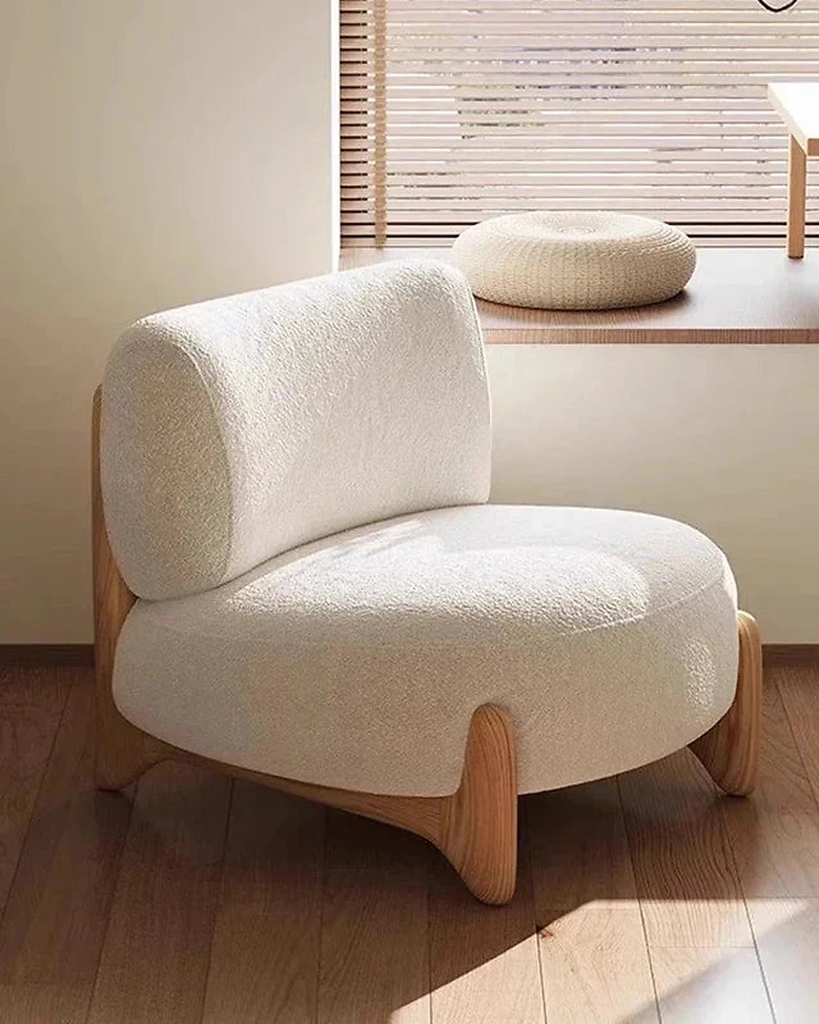 Momo Rounded Lounge Chair, window-side lifestyle setting