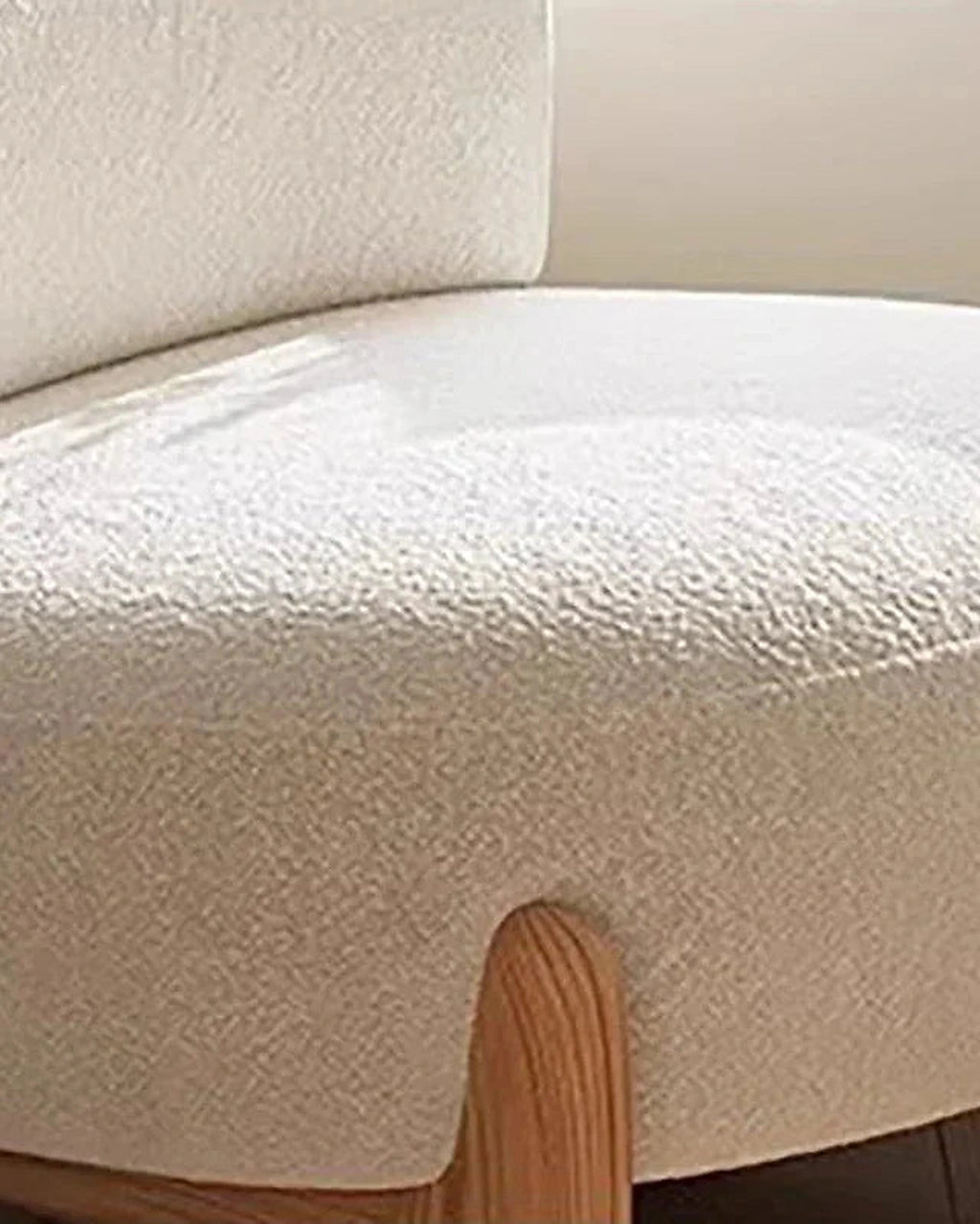 Momo Rounded Lounge Chair, upholstery and timber-foot detail