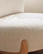 Momo Rounded Lounge Chair, textured upholstery close-up