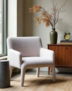 Nami Upholstered Armchair, white upholstery in a window-side setting