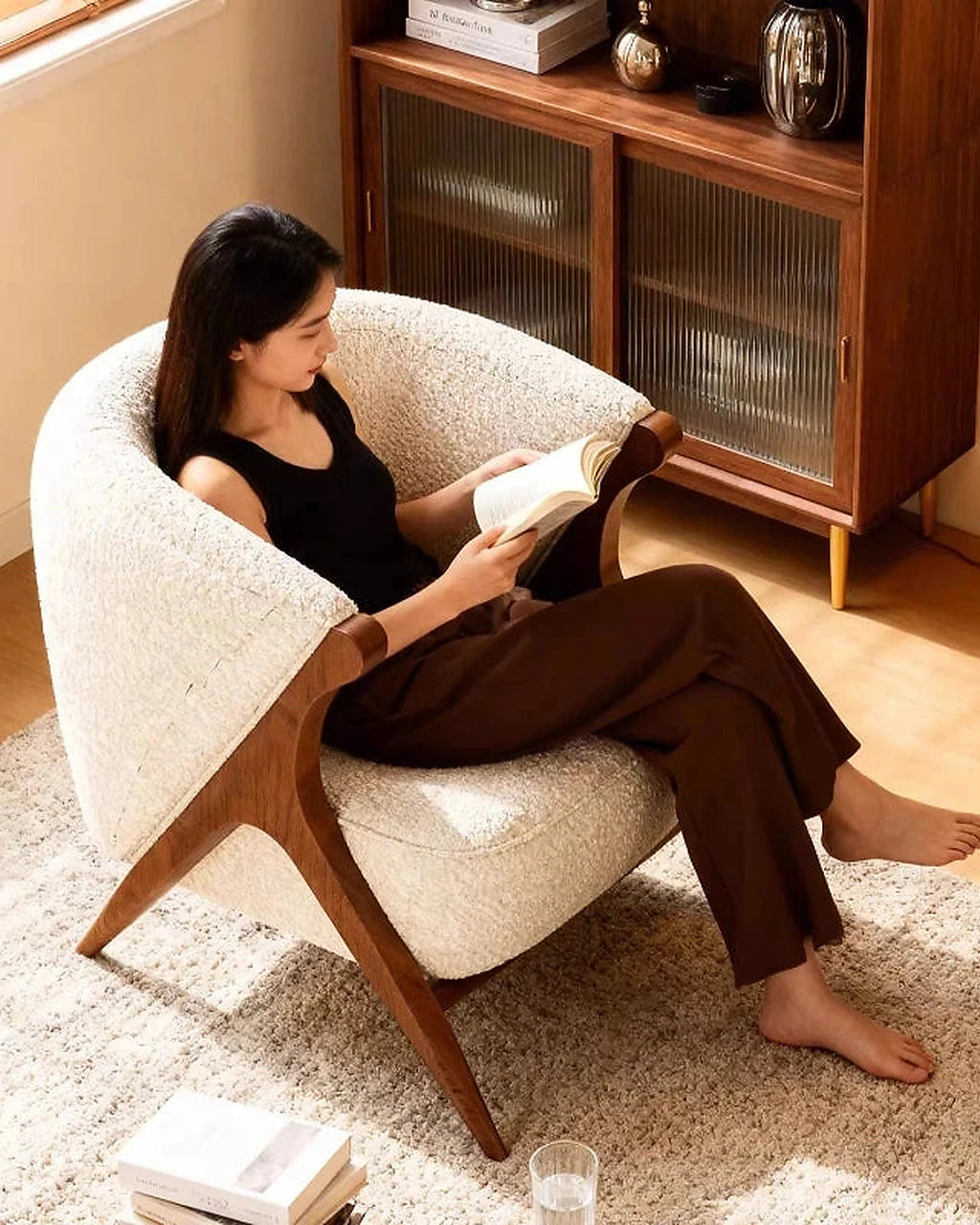 Ren Curved Lounge Chair, cream chair in use