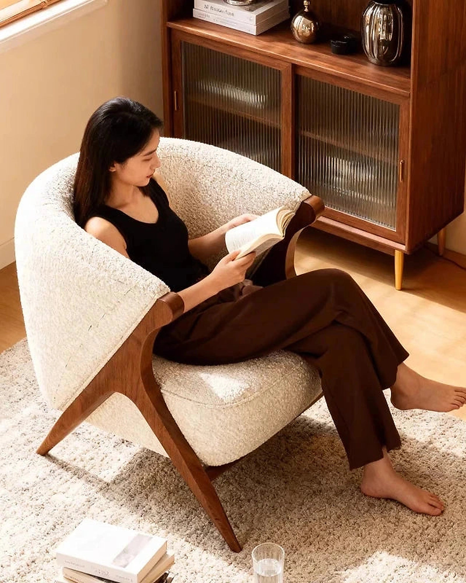 Ren Curved Lounge Chair, cream chair in use