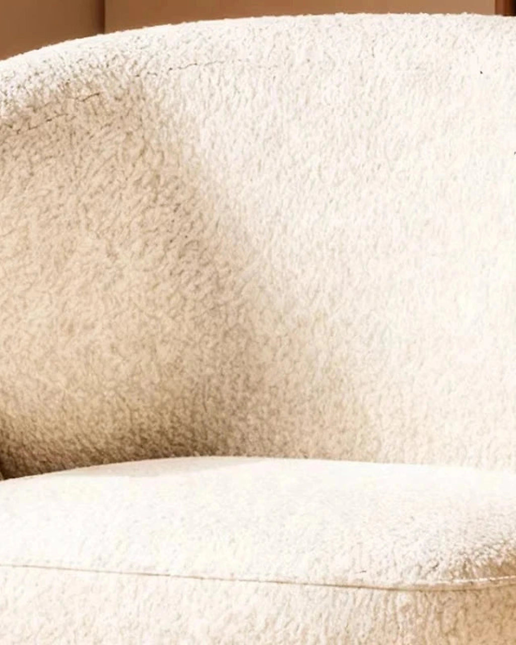 Ren Curved Lounge Chair, cream upholstery close-up