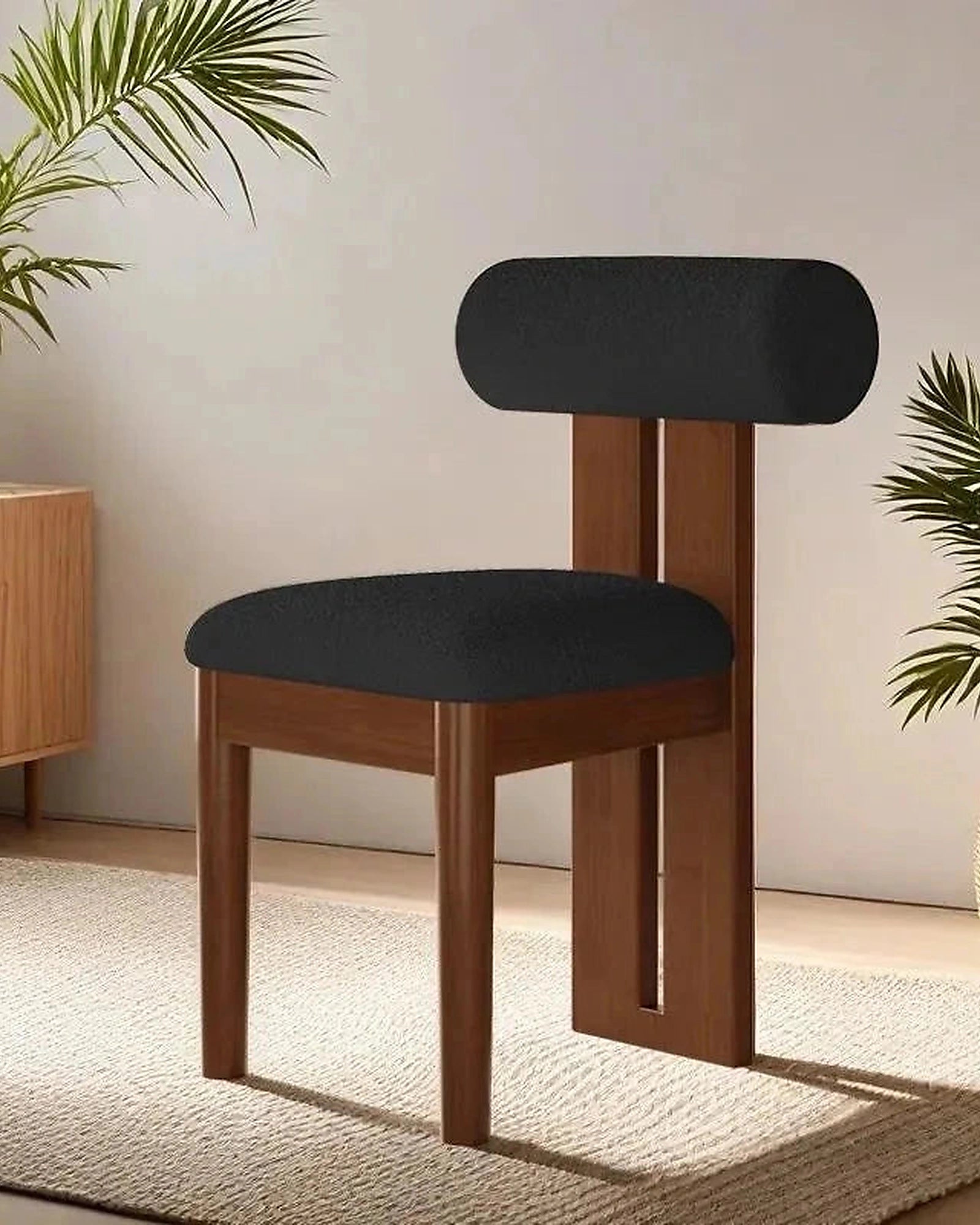 Riku Sculptural Dining Chair, walnut frame with black upholstery