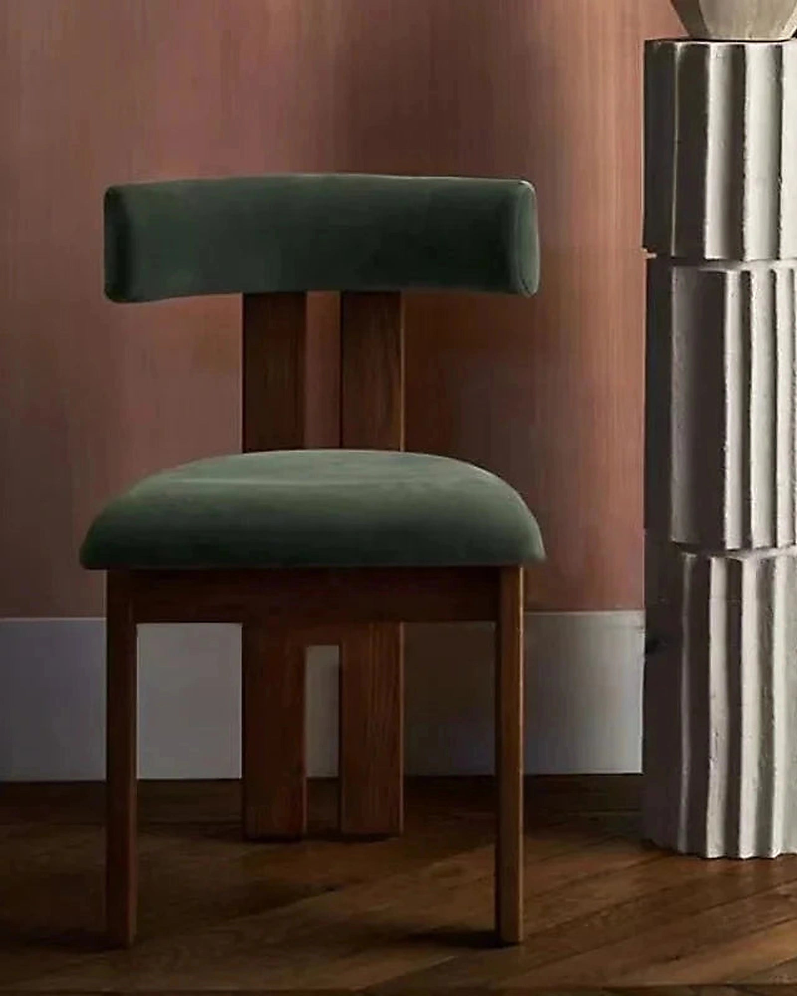 Tori Architectural Dining Chair, green upholstery in a styled interior